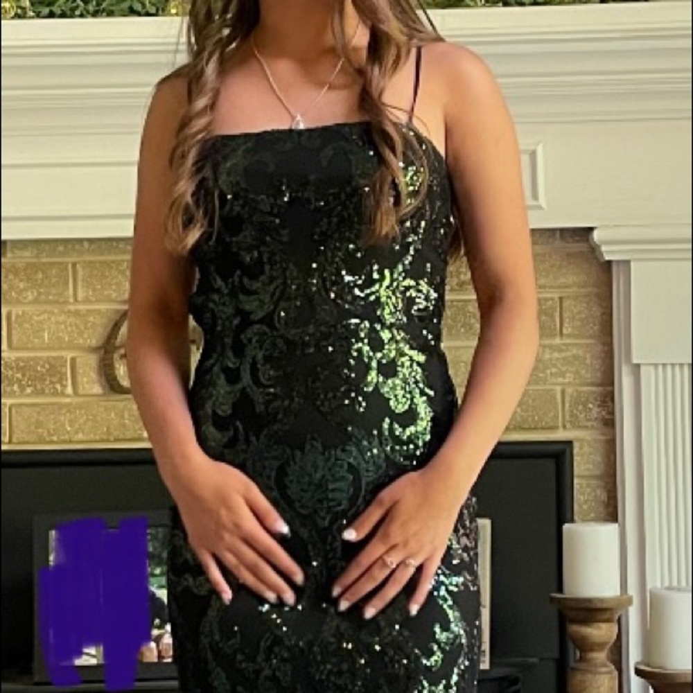 Floor length prom dress, size small. Black underlay with green sequin design.